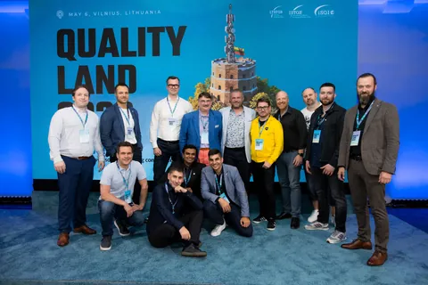 The Quality Land 2026 speaker line-up together in front of the conference backdrop.